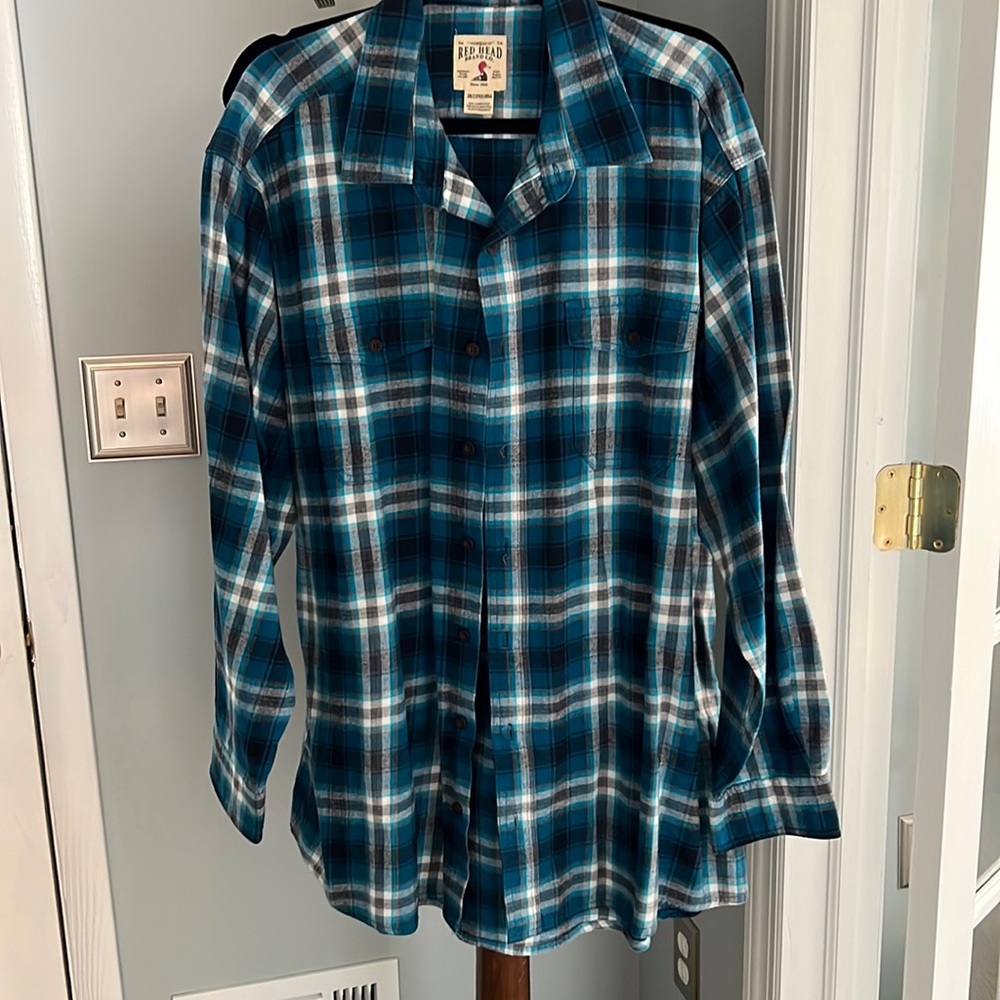 Slightly loved blue size 2XLT flannel.